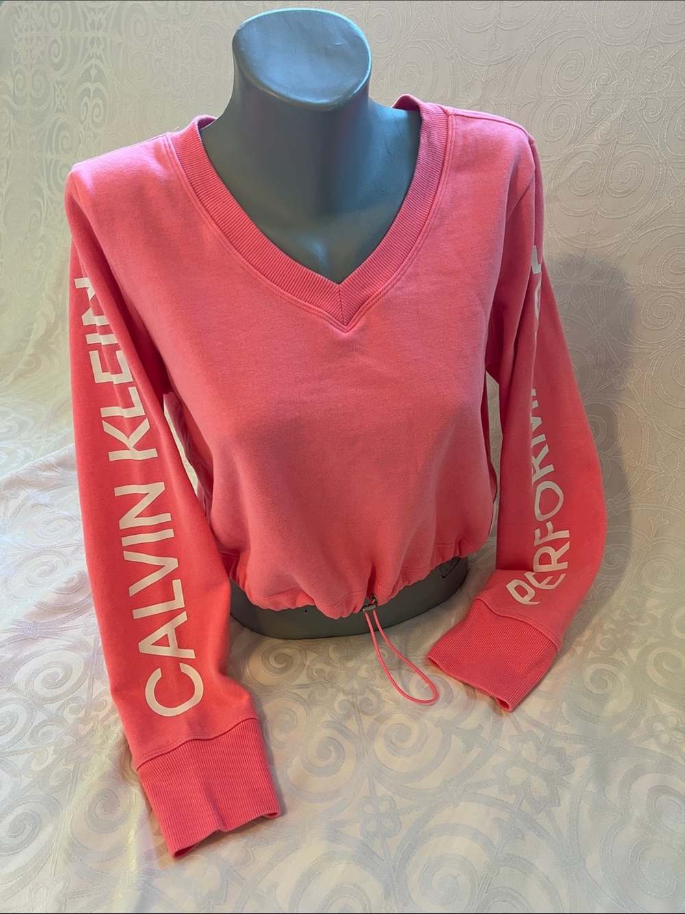 Calvin Klein Performance Coral Pink V-Neck Drawstring Hem Sweatshirt cropped